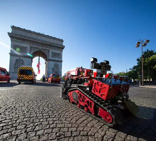 Shark Robotics Colossus firefighting robot at Arc de Triomphe during Bastille Day parade